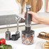 Gunmetal hand blender set with chopper, whisk and blending attachments on kitchen worktop