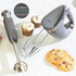 Gunmetal hand mixer and hand blender set on kitchen counter