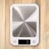 Digital kitchen scale with stainless steel platform and LCD display showing zero grams