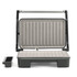 Open electric grill with skewers of grilled chicken and colourful vegetables.