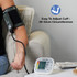 Digital blood pressure monitor with cuff in use, easy adjust 30-42cm, display unit on table