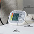 Digital blood pressure monitor with colour-coded indicator, showing systolic, diastolic and pulse rate readings.