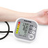 Salter digital blood pressure monitor on adult arm, showing reading on display