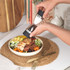 Salter salt and pepper mill with black and steel finish on kitchen shelf