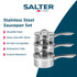 Set of three silver stainless steel saucepans, stacked with lid, shown from side