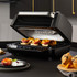 Salter indoor grill with digital controls cooking grilled peaches on pastries in kitchen