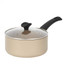 Gold non-stick saucepan with black handle and glass lid