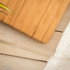 Bamboo digital bathroom scale with LCD display, top-down view