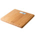 Salter bamboo bathroom scale on light wood floor beside white towel.