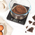 Digital kitchen scale with stainless steel platform, large display, and metric/imperial unit switch