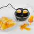 Salter egg cooker with two poached eggs, toast soldiers, and buttered toast slices