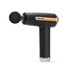 Black and gold handheld massage gun with round attachment, shown from side