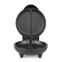 Black electric waffle maker with two non-stick compartments, open and empty