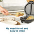 Black non-stick breakfast maker, open, showing two deep compartments