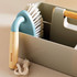 Salter cleaning brush with bamboo handle and blue head in beige caddy