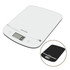 Black digital kitchen scale on white worktop, shown with baking items