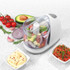 Electric food chopper with clear bowl, filled with fresh vegetables, white model