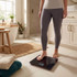 Person standing on digital bathroom scale in modern bathroom