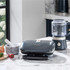 Salter grill close-up showing black drip tray on marble surface