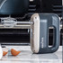 Pair of stainless steel beaters for electric hand mixer, close-up view.