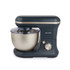 Salter black stand mixer with metal bowl in kitchen, ingredients beside.