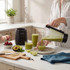Black Salter blender blending tomato soup, shown on kitchen countertop