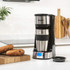 Ground coffee being added to a Salter filter coffee machine
