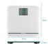White digital bathroom scale with sponge on shelf, next to toilet rolls in white cupboard