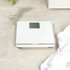 White Salter digital bathroom scale with large display, 32cm x 32cm.