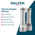 Set of two electric stainless steel salt and pepper grinders on kitchen worktop