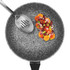 Grey and white speckled non-stick wok, top view