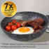 Granite-effect non-stick frying pan with cooked bacon, fried egg and tomatoes; 7x tougher claim badge.