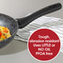 Non-stick black and grey frying pan with food, tough, PFOA free, uses little or no oil.