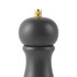 Matte black pepper mill with gold knob, close-up of top section