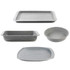 Four-piece grey non-stick bakeware set with roasting tin, baking tray, loaf tin and round cake tin