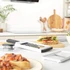 Salter manual food chopper and slicer set with clear containers, on kitchen counter
