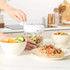 Salter pull chopper with white lid, shown with chopped vegetables inside, for easy food prep