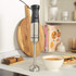 Black and silver hand blender set with food processor bowl and whisk attachment