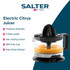Electric citrus juicer with clear jug, black reamer and handle, juice shown inside.