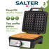 Black Salter deep fill waffle maker with open lid showing two golden waffles on plates.