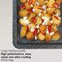 Product image: Oven tray with roasted potatoes, feta cheese and sliced red chillies.