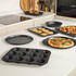 Black 12-cup non-stick muffin tray, product packaging shown, Salter Megastone range