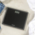 Black digital bathroom scale with LCD display, shown with UK size dimensions