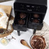 Salter dual air fryer with chocolate muffins baking in two baskets, shown with mixing bowl and ingredients.