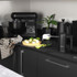 Kitchen countertop with Salter black stand mixer and hand mixer, lime tart and cups.