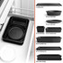 Set of 7 black bakeware pans with cooling rack, stackable design, shown in kitchen drawer