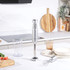 Stainless steel hand blender blade attachment, close-up side view