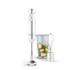Silver hand blender set with whisk and blending jug containing fruit