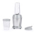 Compact silver blender with two travel cups and lids, ideal for smoothies.