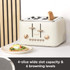 Cream 4-slice toaster with gold dials on kitchen counter, slice of bread popping up